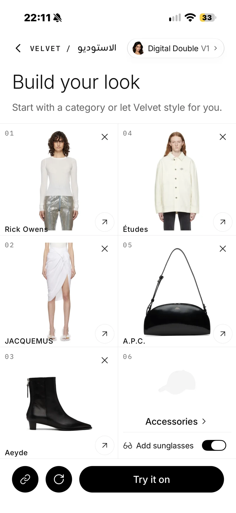 Velvet Outfit Studio with a white top, cream jacket, white skirt, black boots and a black bag selected, and the Try it on button.